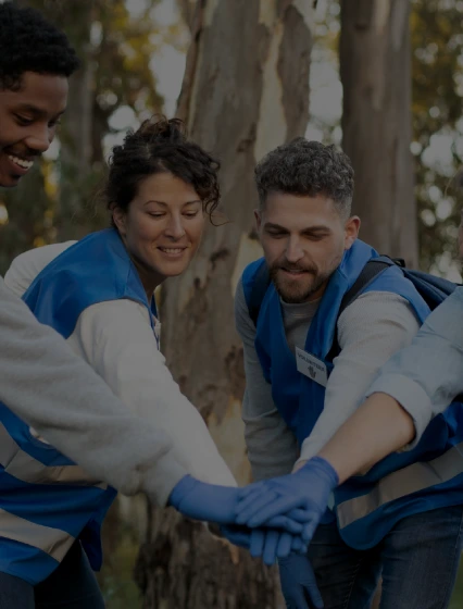 Social impact analytics team collaborating on education and community development initiatives